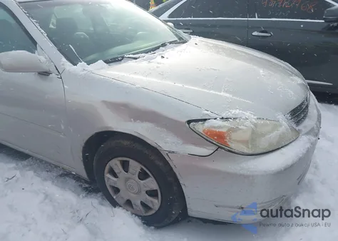 2002 Toyota Camry Le z USA, uszkodzony, nr VIN 4T1BE32K72U613797